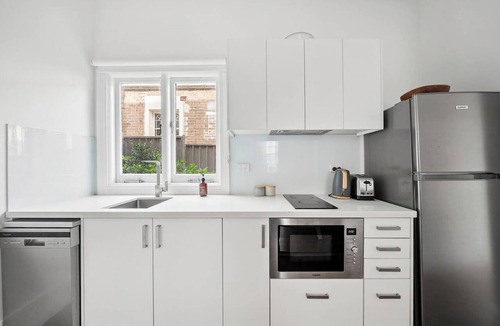 Ashfield Apartment | Courtyard Esperanza Sunny Heritage Chic