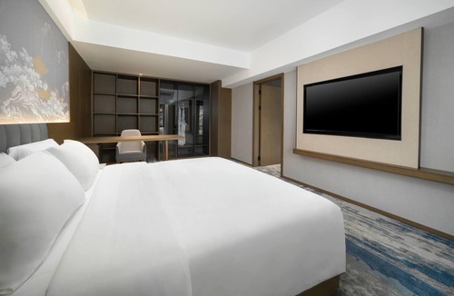 Enshi Hotel | Days Inn By Wyndham Enshi Transport Center Station