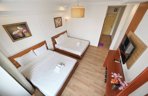 Downtown Ho Chi Minh City Hotel | Deluxe Family Room with City View