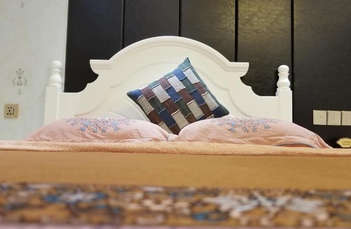Jinghong Apartment | Doudou Meilan Fengqing Inn