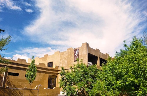 Mingsha Mountain and Crescent Spring House | Dunhuang Jinshe Times Inn
