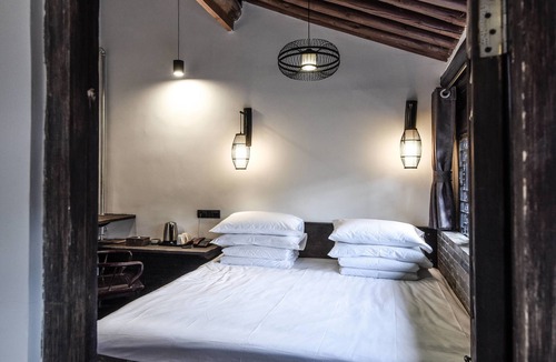 Pingyao Hotel | Elsewhere Hotel The former residence of the draft bank