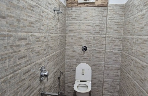 Sualkuchi Apartment | Fabulous 4-bedroom studio with AC in vibrant Guwahati