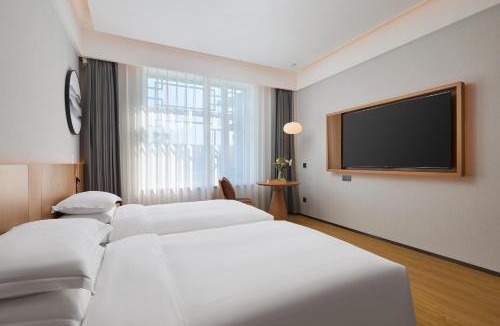Yanji Hotel | Floral Hotel Banlan China Korean Folk Park