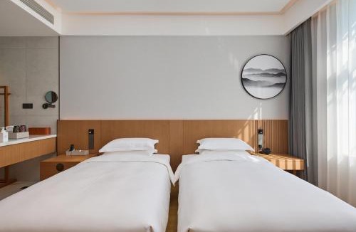 Yanji Hotel | Floral Hotel Banlan China Korean Folk Park