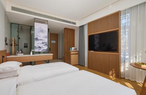 Yanji Hotel | Floral Hotel Banlan China Korean Folk Park