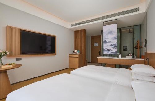 Yanji Hotel | Floral Hotel Banlan China Korean Folk Park