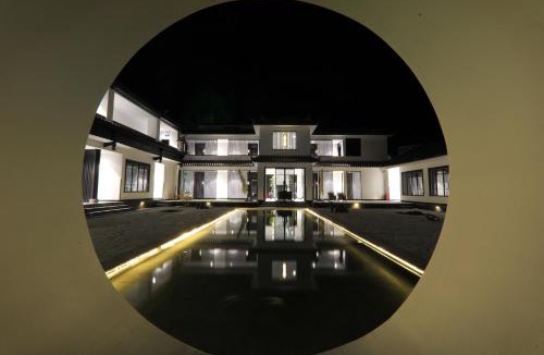Hutiaoxia Hotel | Gong Xili Qingdu Hotel