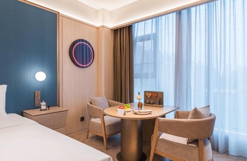Huangpu Hotel | Guangzhou Olympic Sports Centre Financial City Crystal Orange Hotel
