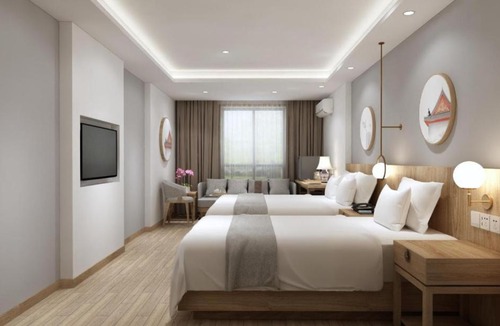 Wangfujing Shopping Area Hotel | Happy Dragon Saga Hotel with terrace - Free wifi with fluent English speaking Tourist ticket service Near Tian ' AnMen Forbidden City