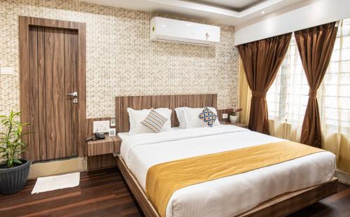 Sualkuchi Hotel | HOTEL BRAHMAPUTRA MADHUKALYA