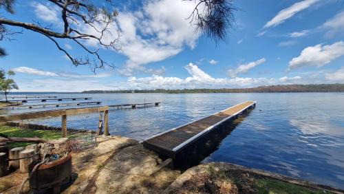 Erowal Bay House | Jerrinja - Absolute waterfront with jetty - 5 mins to Hyams Beach