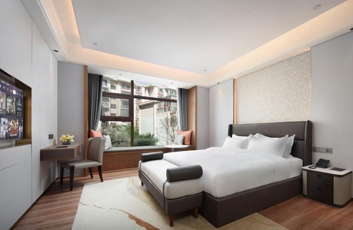 Panlong Hotel | Join Hands Bless Hotel