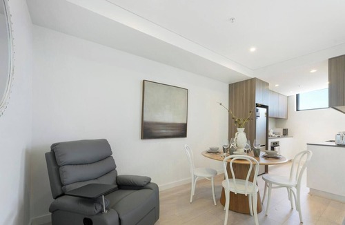 Burwood Apartment | KozyGuru | Burwood | City Skyline – Steps to Train