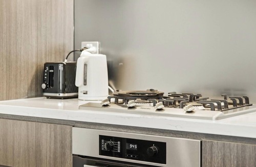 Lidcombe Apartment | KozyGuru | Lidcombe | Olympic Park Gem + Parking