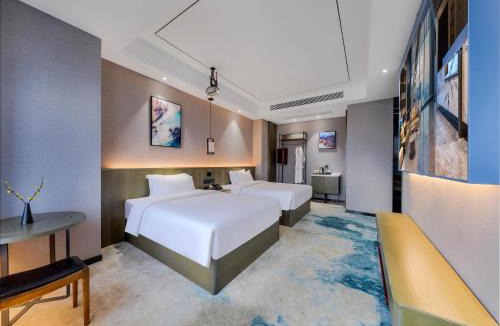 Erqi District Hotel | Madison Hotel Zhengzhou South University Road