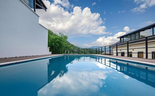 Anji Hotel | ManToo · Forest Above the Clouds Bamboo Hot Spring Resort(Anji Yu Village)
