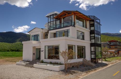 Shangri-La Hotel | Miyinxianye Snow Mountain Makino Migratory Bird Viewing B&B Napa Sea Scenic Area Branch