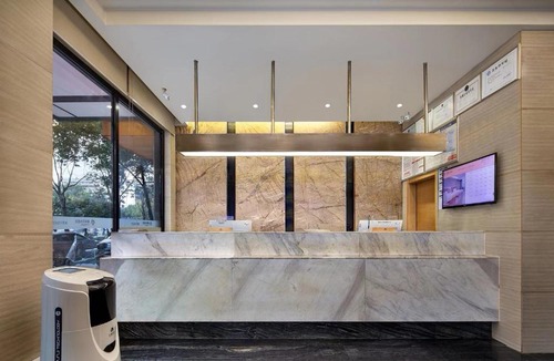 Louxing District Hotel | Morninginn, Humanities and Technology College