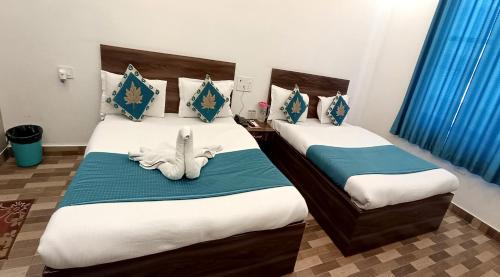 Vrindavan Hotel | NV Palace - Best Hotel in Vrindavan Near Prem Mandir and Iskcon Temple with Private Parking