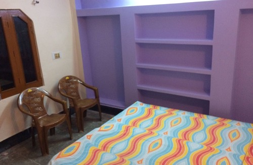 Aliganj House | Open terrace with double bedroom