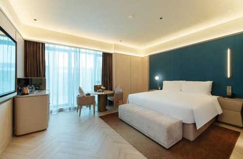 Lianyungang Hotel | Orange Crystal Hotel Lianyungang High-speed Railway Station