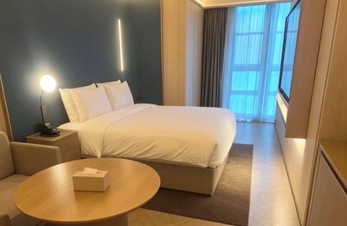 Pudong Hotel | Orange Crystal Hotel - South Yanggao Road, Shanghai New International Expo Center