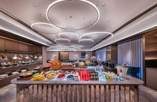 Guangling Qu Hotel | Orange Crystal Hotel Yangzhou East Railway Station Grand Canal