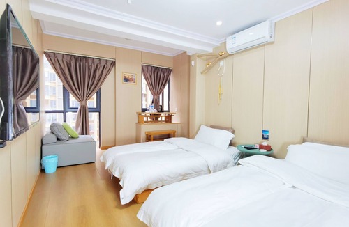Gaoxin Hotel | Orange Mingwu Hotel