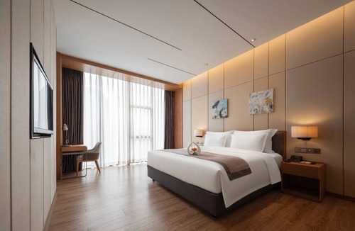 Zhuhai Gongbei Hotel | Palm Spring Hotel