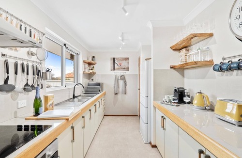 Halls Head Villa | PRIME BEACHFRONT. PRIME VIEWS. PRIME TIME. Elegance, with mobility elevator.