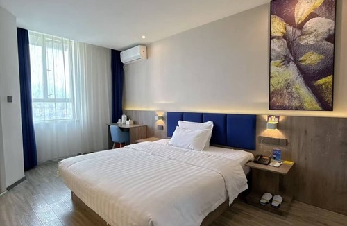 Yongding Hotel | QīTiānYōupǐnZhāngjiājièDàyōngGǔchéngDiàn