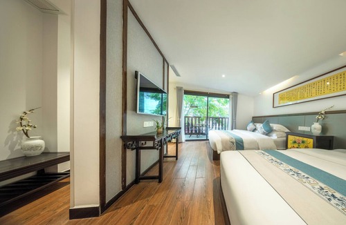 Fenghuang Hotel | Qixin Xianting Hotel