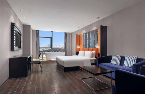 Jingkou District Hotel | Ramada by Wyndham Zhenjiang Dagang New District