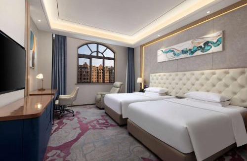 Yicheng District Hotel | Ramada by Wyndham Zhumadian West Station