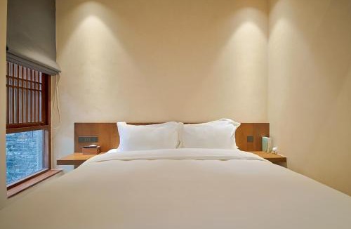 Guangling Qu Hotel | Refactoring Bingouguan Humanities Holiday Hotel (Yangzhou Dongguan Street)