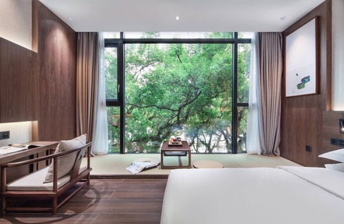 Xiufeng Hotel | Riverside Wing Hotel Guilin