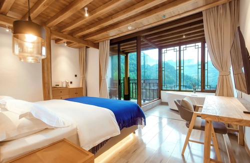 Qiandongnan Hotel | Sanchunli Meng Resort Hotel