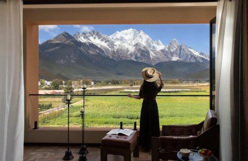 Gucheng District Hotel | ShanJuanYun Panoramic Sunlit Yulong Snow Mountain Hotel Near Shuhe Ancient Town Near Baisha Ancient Town One free round-trip shuttle ride to the scenic area Brunch Free self-service laundry A quiet environment