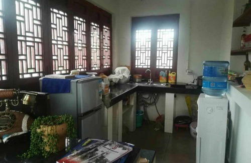 Shilin Yi Autonomous County Hotel | Shi Lin family folk inn