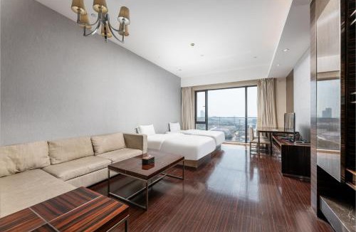 Haizhu Apartment | Snug Gaokong Jiangjing Hotel- Poly World Trade Center