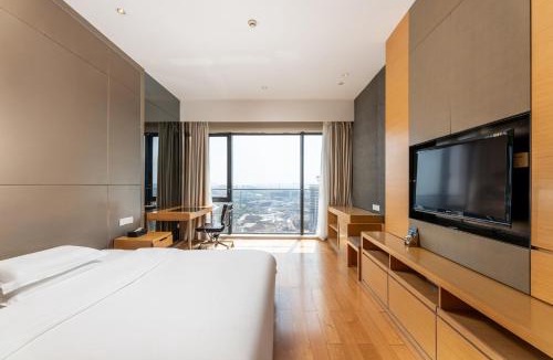 Haizhu Apartment | Snug Gaokong Jiangjing Hotel- Poly World Trade Center