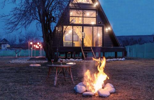 Srinagar Villa | StayVista at The Loft - A-Frame Structure, English Interiors, Bonfire