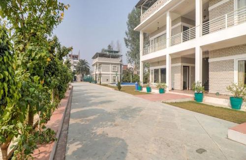 Auli Hotel | Super Townhouse Amaraa Farms Near LuLu Hypermarket