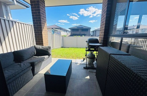 Austral House | Sydney's Leading 5 Bedroom home with AC, TVs and Study - Home away from home