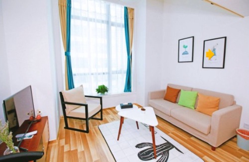 Xinghai Commercial Area Apartment | The Roost Hotel