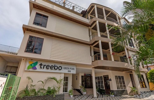 Beltola Hotel | Treebo Green Pearl Inn