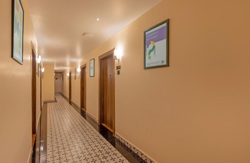 Beltola Hotel | Treebo Green Pearl Inn