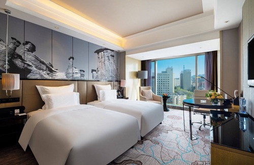 Xinshi District Hotel | Universal Hotel Urumqi