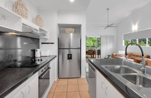 Trinity Beach Apartment | Wallaby Outlook- Tranquil Trinity Beach Retreat | Pool, Balcony & Nature Views